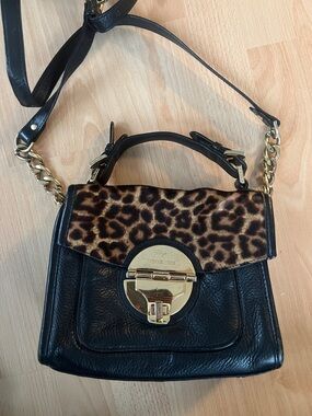 Michael Kors Black Leather Satchel with Leopard-Print Flap and Gold Hardware